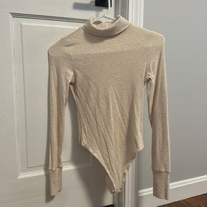 Super cute XS tan bodysuit